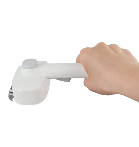 Kombineeritud kraas ja pusade harutaja FurEase 2-in-1 Brush (AFP - Pet Salon)